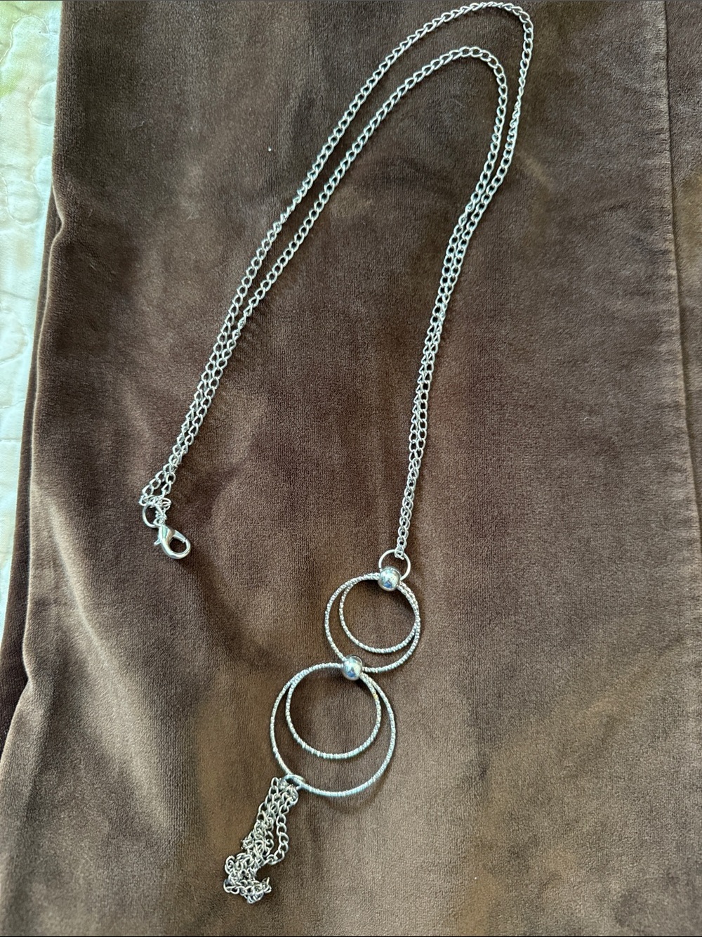 dressbarn Silver-Tone Interlocking Ring Necklace with Tassel